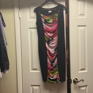 Size 10 black dress with flowered ruching detail.